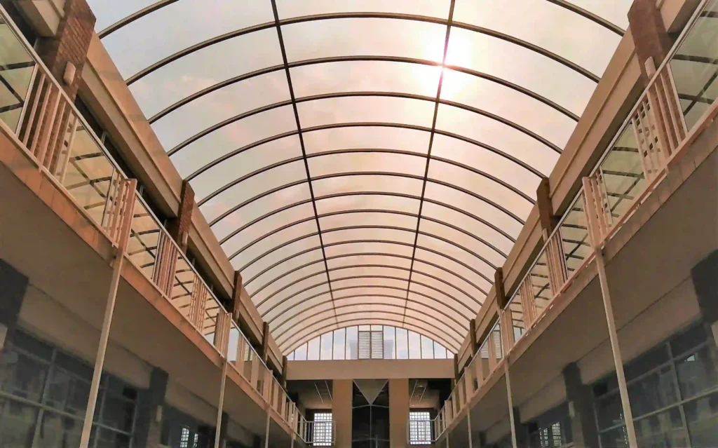 View of contemporary building design looking up inside Loapi House courtyard with corporate offices to let in Loapi Business Centre Gaborone