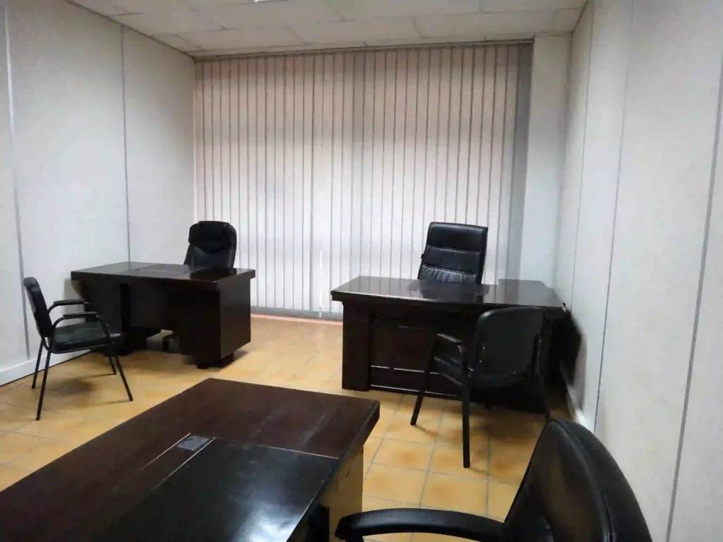 30m2 larger size office space for rent in LBC Loapi Business Centre Gaborone showing floor to ceiling windows with blinds and air conditioning at Loapi House
