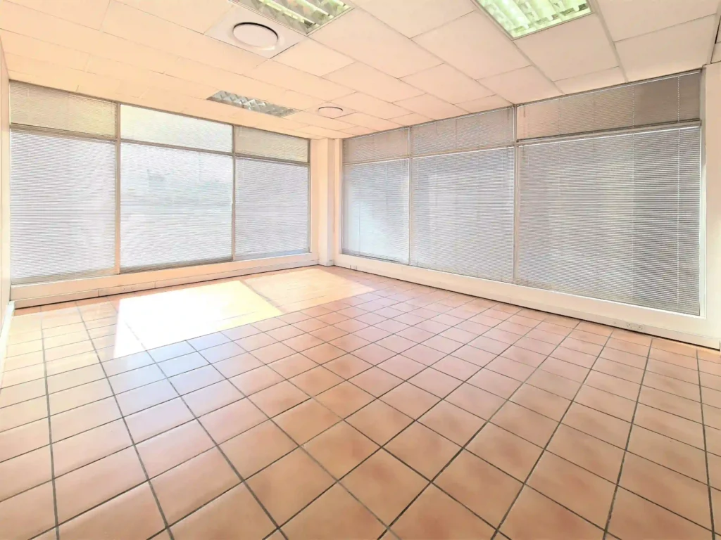 34m2 ground floor office space for rent in Loapi Business Centre Gaborone at Loapi House showing floor to ceiling windows with blinds for growing companies of 4 staff